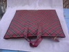 A padded vinyl bag/cushion 