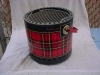 A portable charcoal grill.
